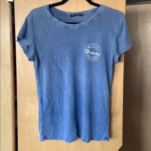 A blue short sleeved shirt from Brandy Melville